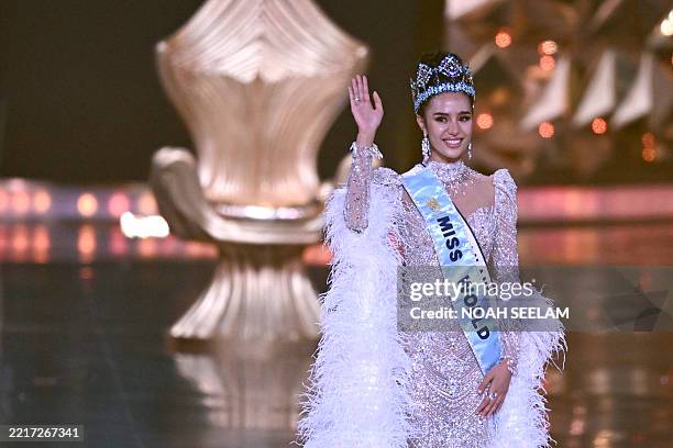 Thailand's Opal Suchata Chuangsri celebrates after winning the 72th Miss World 2025 pageant at the HITEX Exhibition Centre in Hyderabad on May 31,...