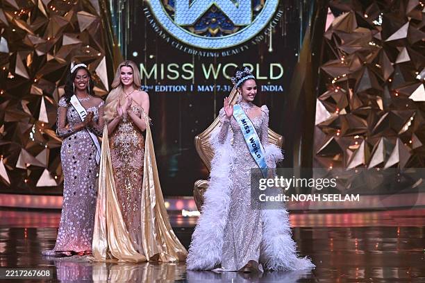Thailand's Opal Suchata Chuangsri celebrates after winning the 72th Miss World 2025 pageant at the HITEX Exhibition Centre in Hyderabad on May 31,...