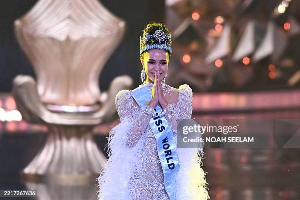 Thailand's Opal Suchata Chuangsri celebrates after winning the 72th Miss World 2025 pageant at the HITEX Exhibition Centre in Hyderabad on May 31,...