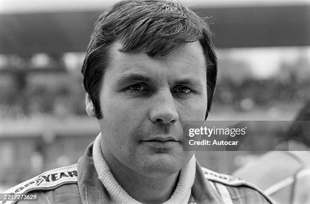 Alan Jones at the German GP, Hockenheimring, Germany, 29th-31st July 1977.