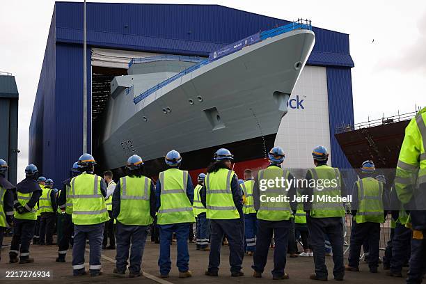 Type 31 frigate HMS Venturer is rolled out from the build hall at Babcock Rosyth on May 27, 2025 in Rosyth, Scotland. The Royal Navy's new frigate,...