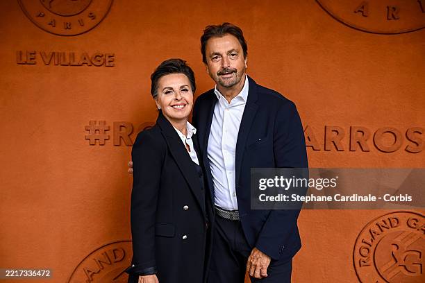Maria Dowlatshahi and Henri Leconte attend the 2025 French Open at Roland Garros on May 27, 2025 in Paris, France.