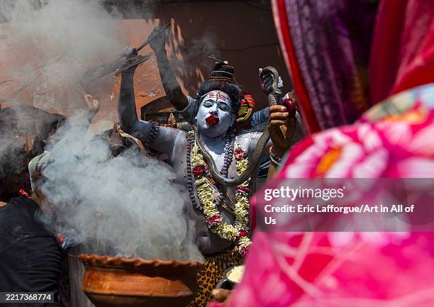 Lord Shiva procession with devotees at Lal Kach festival, Dhaka Division, Munshiganj, Bangladesh on April 13, 2025 in Munshiganj, Bangladesh.