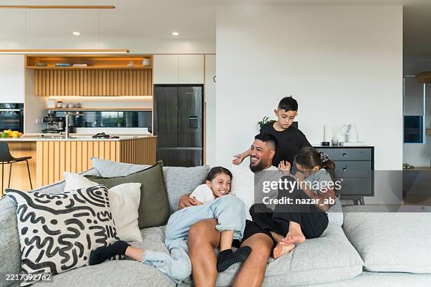 togetherness, the foundation for father-child relationships. - comfortable stock pictures, royalty-free photos & images