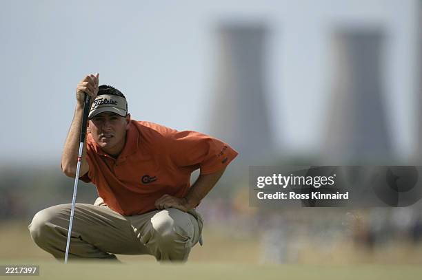 Ben Curtis of the USA lines up his putt on the tenth green during the final round of the Open Championship at the Royal St. George's course on July...