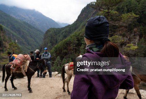 Young woman trekker in Khumbu region Young woman trekker in Khumbu region