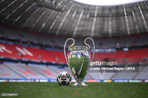 The official match ball is seen with the Champions League trophy ahead of the UEFA Champions League Final 2025 between Paris Saint-Germain and FC...
