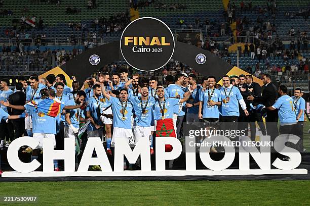 Pyramids' players celebrate winning the CAF Champions League final football match between Pyramids FC and Mamelodi Sundowns at 30 June Stadium in...