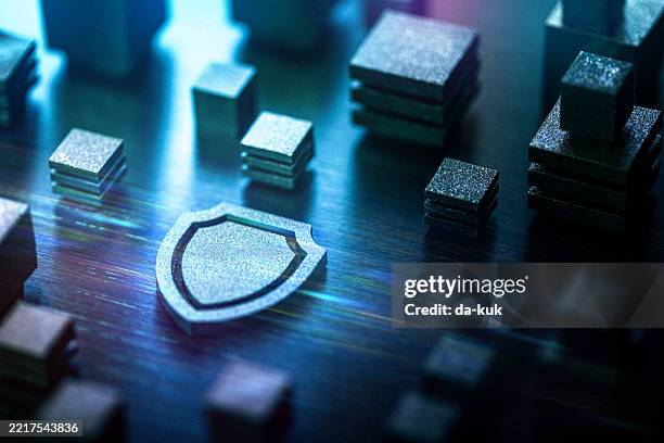 futuristic security concept showcasing shield icon and digital network elements representing internet safety and protection - cloud computing abstract stock pictures, royalty-free photos & images