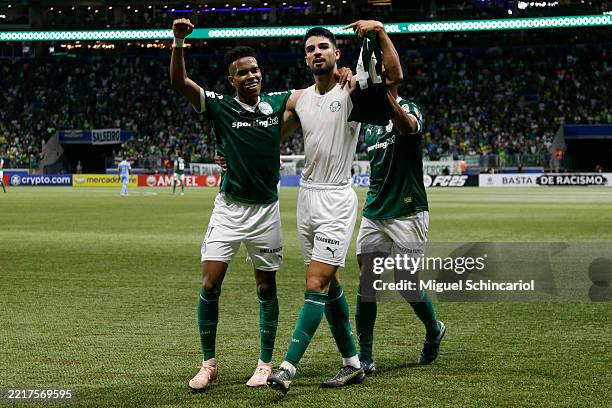 José Manuel López of Palmeiras celebrates with teammate Estevao Willian after scoring the second goal of his team during the Copa CONMEBOL...