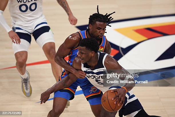 Anthony Edwards of the Minnesota Timberwolves drives the ball against the Oklahoma City Thunder during the second quarter in Game Five of the Western...