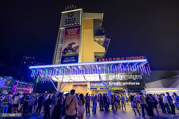 the hong kong jockey club happy valley racecourse - hong kong island stock pictures, royalty-free photos & images