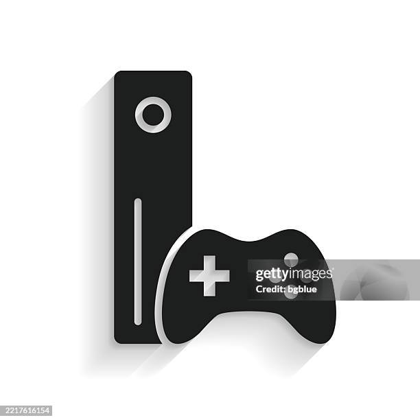 game console with gamepad. icon with long shadow on white background - gaming controller white stock illustrations