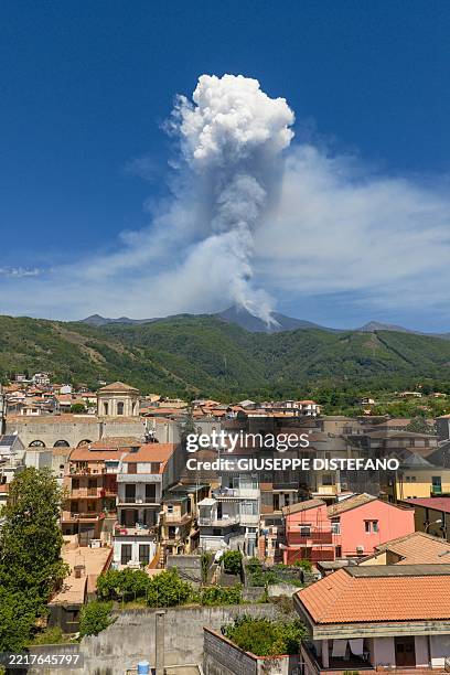 Smoke rises from the crater of the Etna volcano as it erupts, on Mount Etna near Catania on June 2, 2025. A huge plume of ash, gas and rock spewed...