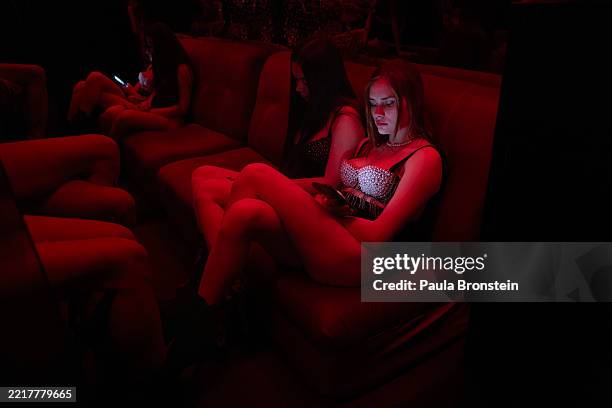 Ukrainian dancers ready for work at Flash Dancers Exotic dance club waiting for customers on May 31, 2025 in Kharkiv, Ukraine. Flash Dancers exotic...