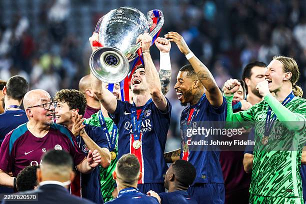 Fabian RUIZ of PSG celebrates the victory and and lift the UEFA Champions League Trophy after the UEFA Champions League 2024/2025, final match...