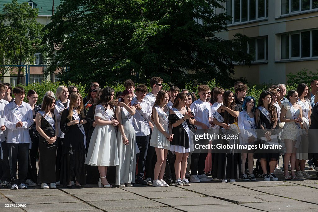 Last Bell School graduates attend the last bell ceremony marking the end of the ...