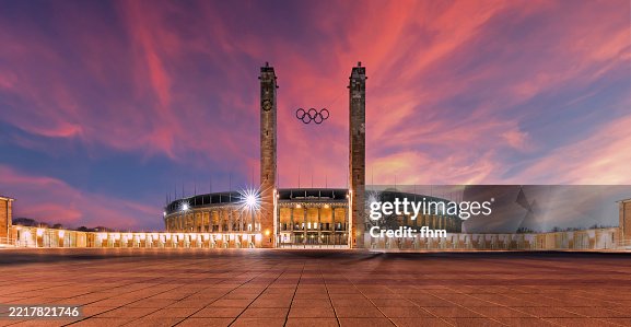 Olympiastadion Berlin with dramatic sunset sky Olympiastadion Berlin with dramatic sunset sky