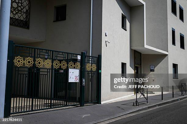 This photograph shows the entrance of the Errahma mosque in Villeurbanne, central France, on June 3, 2025. A Koran was stolen and burnt at a mosque...