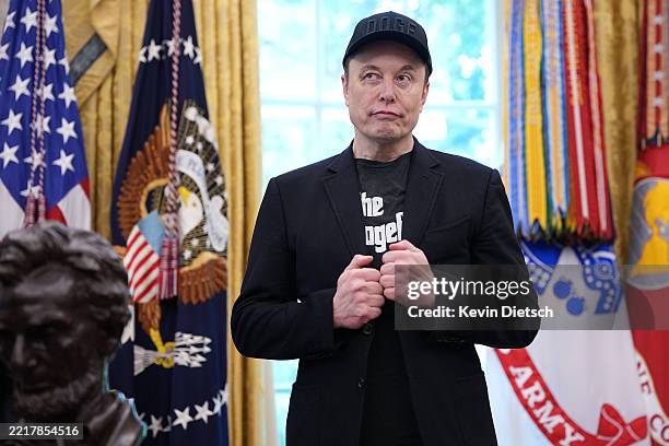 Tesla CEO Elon Musk listens as U.S. President Donald Trump speaks to reporters in the Oval Office of the White House on May 30, 2025 in Washington,...