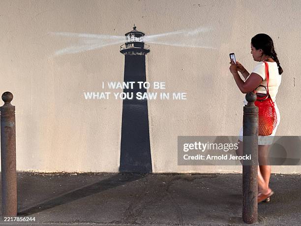 People came to see a recent artwork attributed to street artist Banksy on May 30, 2025 in Marseille, France. A mural purportedly by the artist Banksy...
