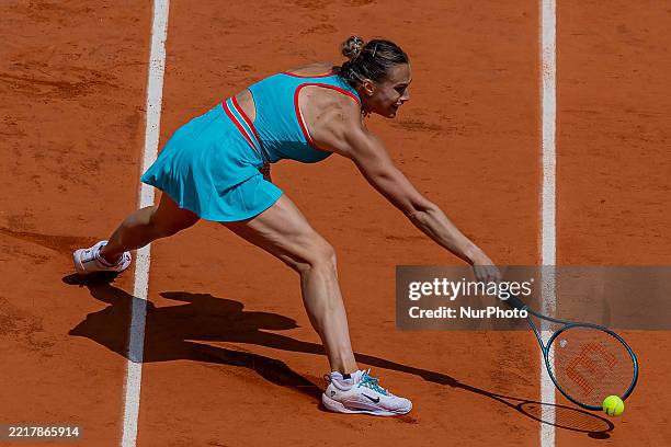Aryna Sabalenka returns the ball against Qinwen Zheng at the Roland Garros Grand Slam Tournament in Paris, France, on June 3, 2025.