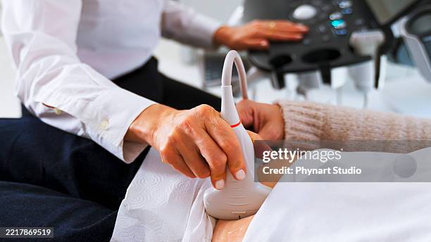 ultrasound scanning of intestines, abdominal cavity, right lobe, liver, bile ducts, gallbladder - ovarian cancer stock pictures, royalty-free photos & images