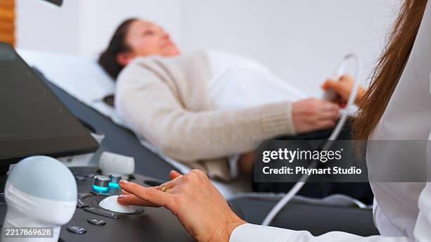 ultrasound scanning of intestines, abdominal cavity, right lobe, liver, bile ducts, gallbladder - colposcopy stock pictures, royalty-free photos & images