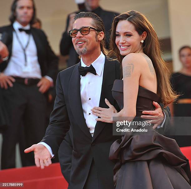 File photo dated May 16, 2011 shows UN Special Envoy and actress Angelina Jolie and actor Brad Pitt attending to the screening of 'The Tree of Life'...