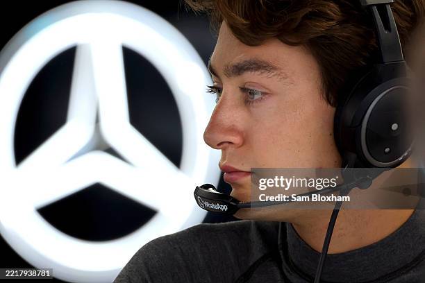 George Russell of Great Britain and Mercedes AMG Petronas F1 Team looks on in the garage during practice ahead of the F1 Grand Prix of Spain at...