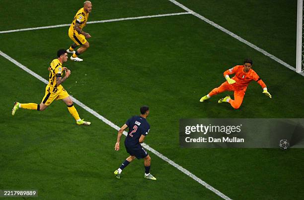 Achraf Hakimi of Paris Saint-Germain scores his team's first goal past Yann Sommer of FC Internazionale during the UEFA Champions League Final 2025...