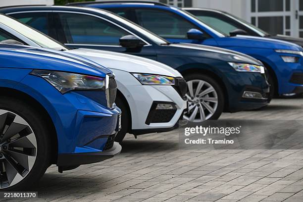 modern cars in a row - lease agreement stock pictures, royalty-free photos & images