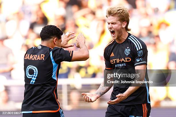 Keaton Parks and Monsef Bakrar of New York City FC celebrate after a goal during the second half of the match against the Nashville SC at GEODIS Park...
