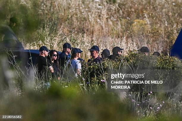 Police investigators arrive to continue an ongoing search operation in the investigation into the disappearance of Madeleine McCann at Atalaia, Lagos...