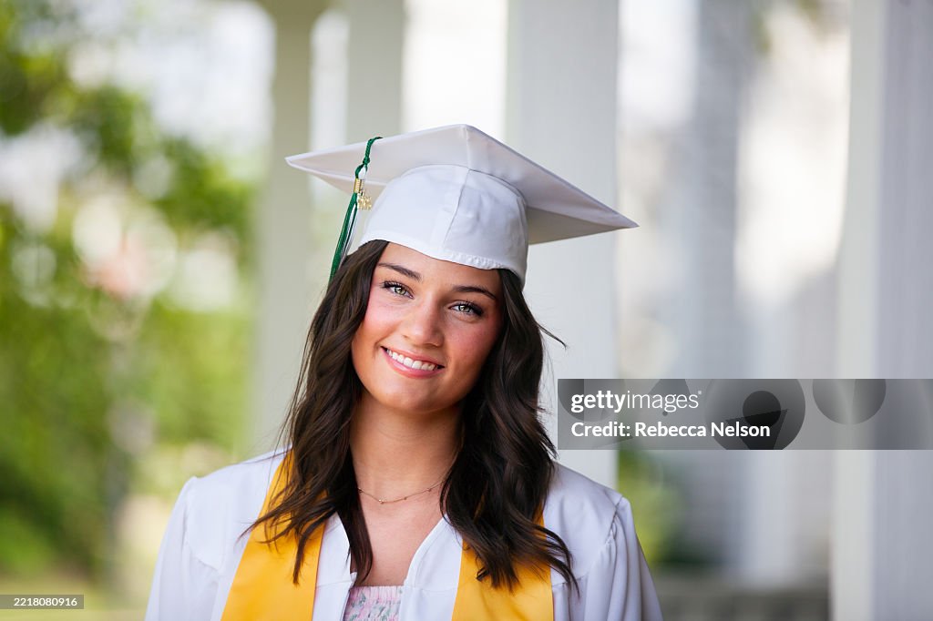 Senior Grad High School Seniors In Cap And Gown On Graduation Day High-Res Stock ...