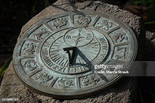 old sundial marking time - sundial stock pictures, royalty-free photos & images