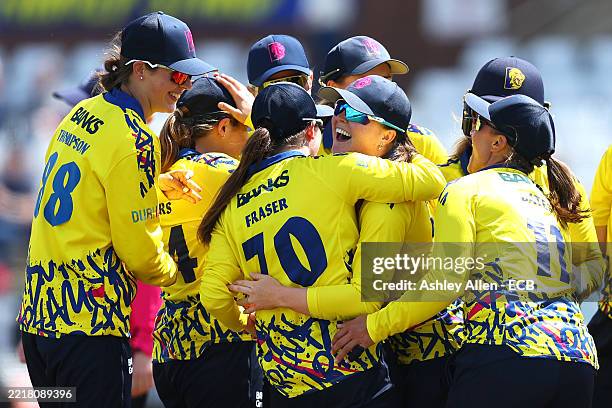 Mady Villiers of Durham Cricket celebrates with teammates after catching Sophie Ecclestone of Lancashire Thunder during the Vitality Blast Women's...