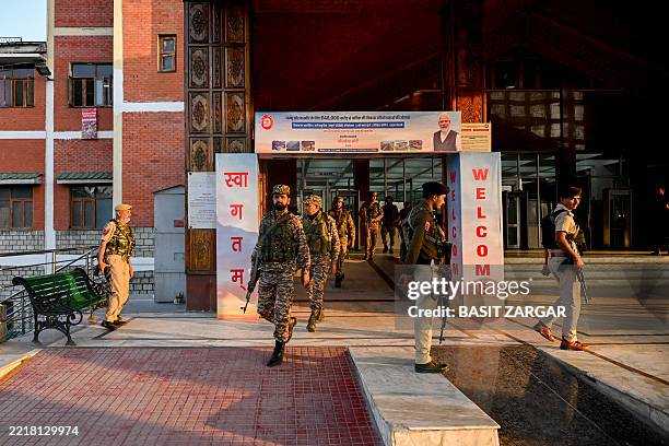 Security personnel guard Vande Bharat train at Nowgam railway station in Srinagar, India-administered Jammu and Kashmir on June 5 all set to be...