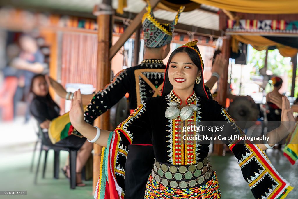 Cheerful Kadazan Dusun Tindal Girl in a Kota Belud Sinipak Attire During Kaamatan Harvest Festival in Kota Kinabalu