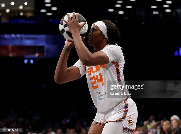 Aneesah Morrow of the Connecticut Sun takes a three point shot in the second half against the New York Liberty at Barclays Center on June 01, 2025 in...