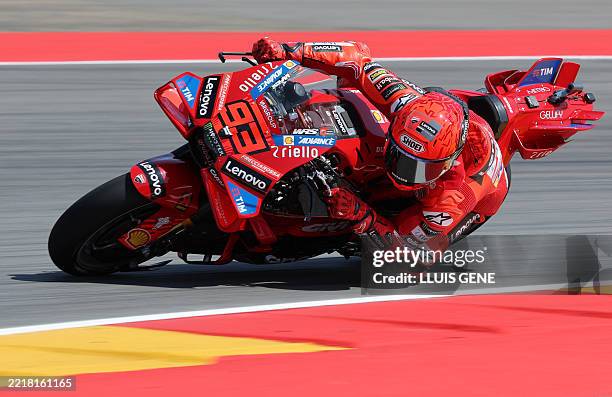 Ducati Lenovo Team's Spanish rider Marc Marquez takes a curve during the first free practice session of the MotoGP Aragon Grand Prix at the Motorland...