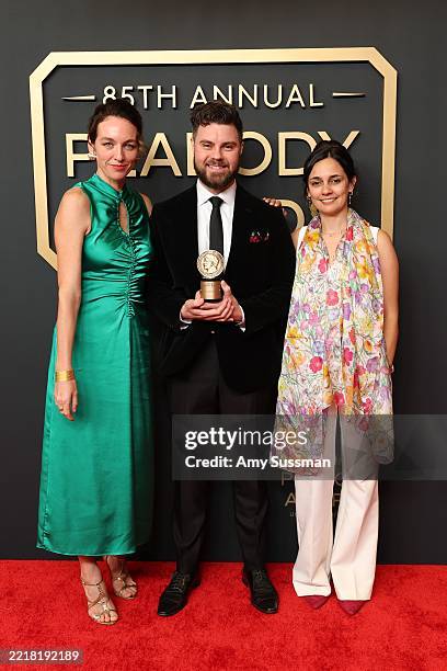 Tierney Bonini, Donald Cameron and Antonia Perello, winners of the Peabody Award for “One Day in Gaza | Close Up," pose in the press room during the...