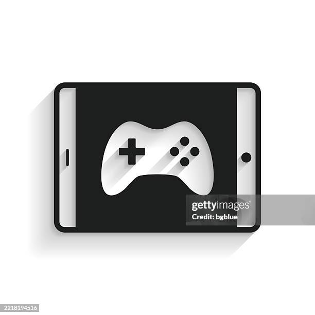 video game on tablet pc. icon with long shadow on white background - console controller isolated stock illustrations