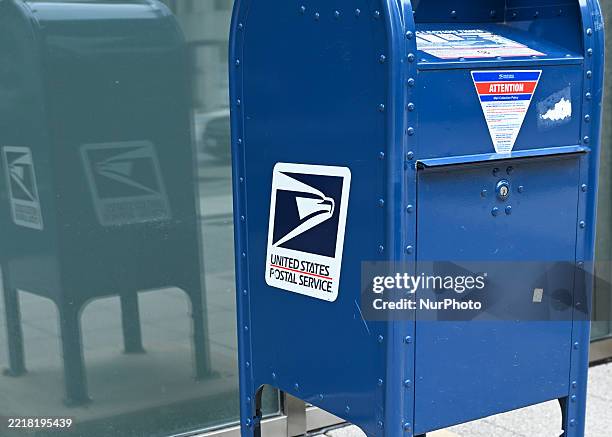 United States Postal Service logo is seen on a mailbox in Washington, District of Columbia, May 27, 2025.