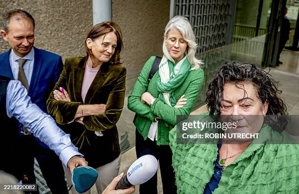 Leader of the FarmerCitizen Movement and member of the House of Representatives Caroline van der Plas answers journalists as outgoing Minister Eddy...