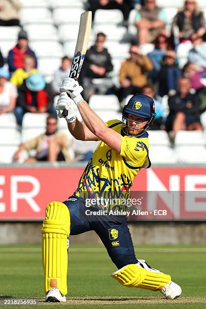Jimmy Neesham of Durham Cricket hits four runs during the Vitality Blast Men's T20 match between Durham Cricket and Lancashire Lightning at Banks...