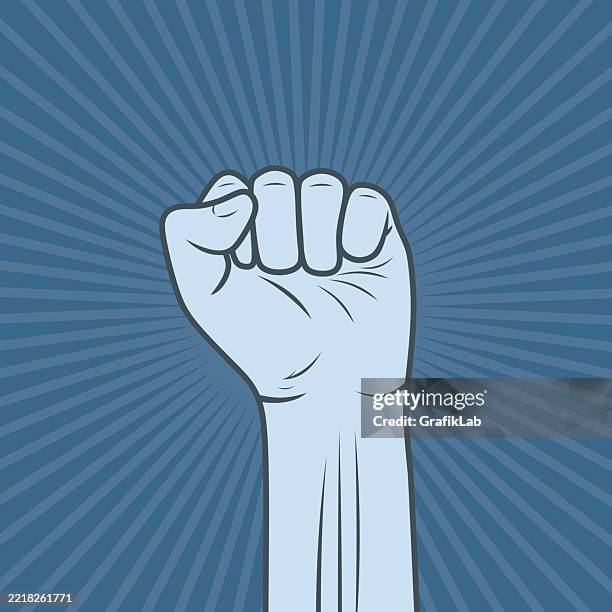 raised fist on blue background symbolizing support and solidarity - self sufficiency stock illustrations