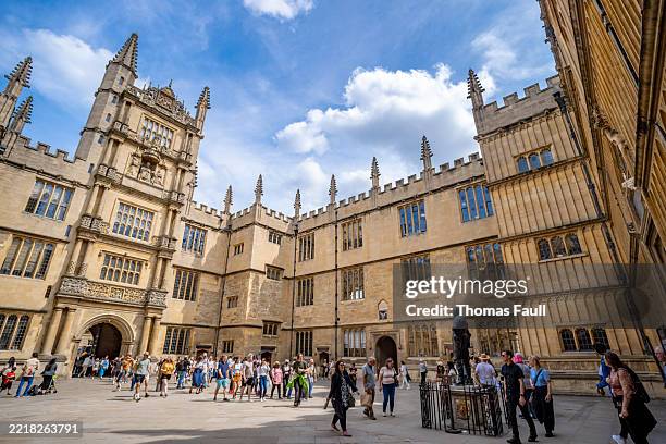 people at bodleian old library in oxford - oxford england stock pictures, royalty-free photos & images