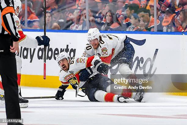 Brad Marchand of the Florida Panthers celebrates his game winning goal in double overtime with teammate Jesper Boqvist to defeat the Edmonton Oilers...