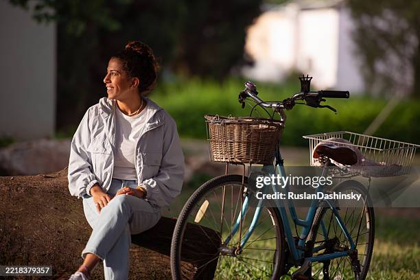 peaceful moment with bicycle in the afternoon light. - afternoon stock pictures, royalty-free photos & images